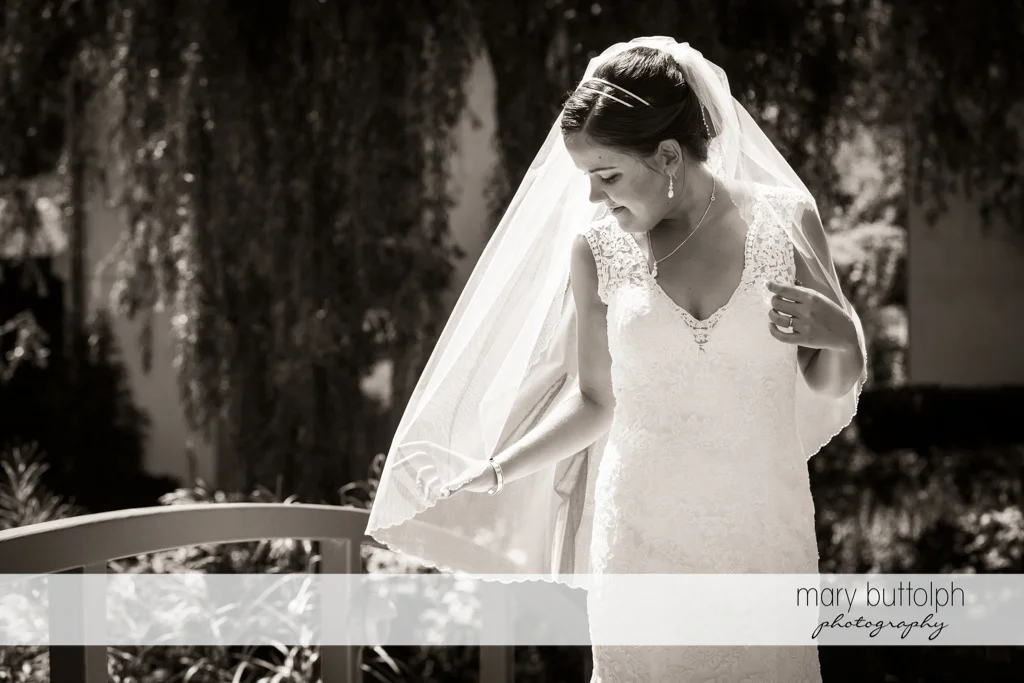 Bride in dramatic black and white shot at The Lodge at Welch Allyn Wedding