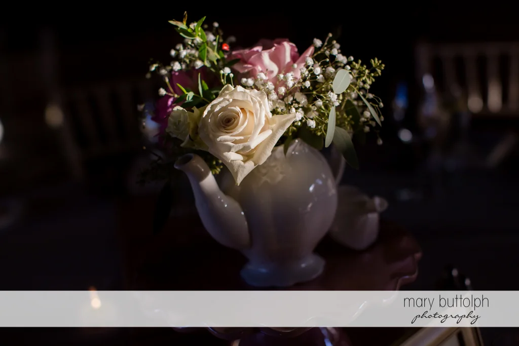 Wedding bouquet in a teapot at The Lodge at Welch Allyn Wedding