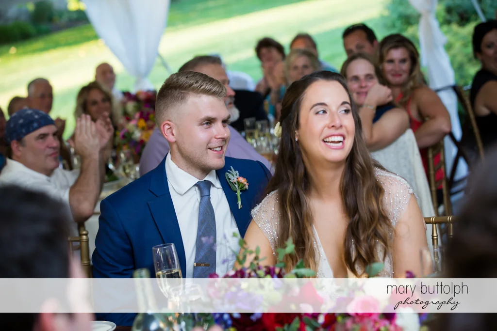 Couple having a good time with guests at Aurora Inn Wedding