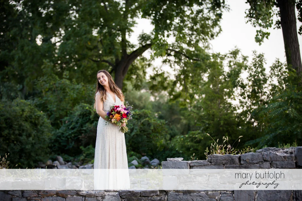 Bride poses for posterity at Aurora Inn Wedding