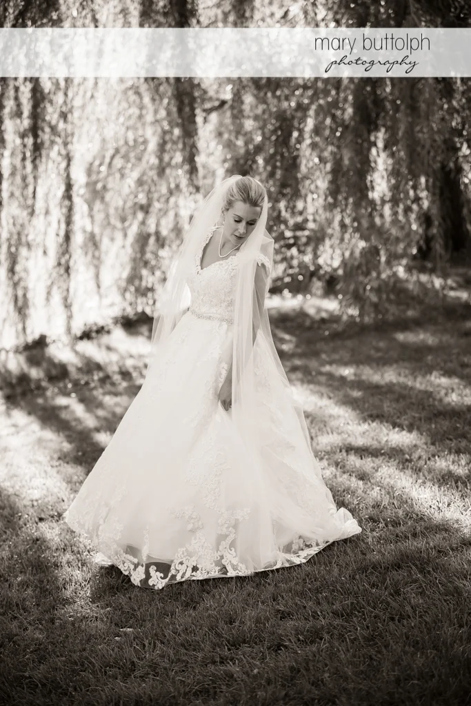 Bride poses in the park at SKY Armory Wedding