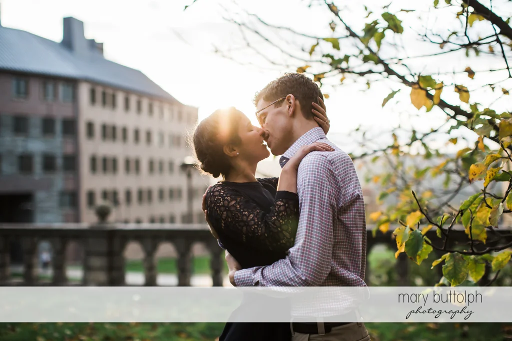 Couple kiss each other at Cornell University Engagement