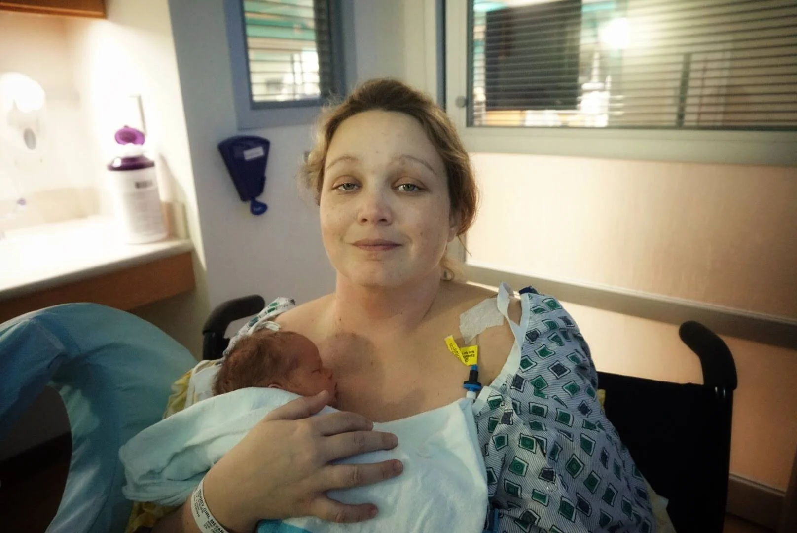Megan meets her two day old daughter for the first time (Photo Credit: Megan Moody)