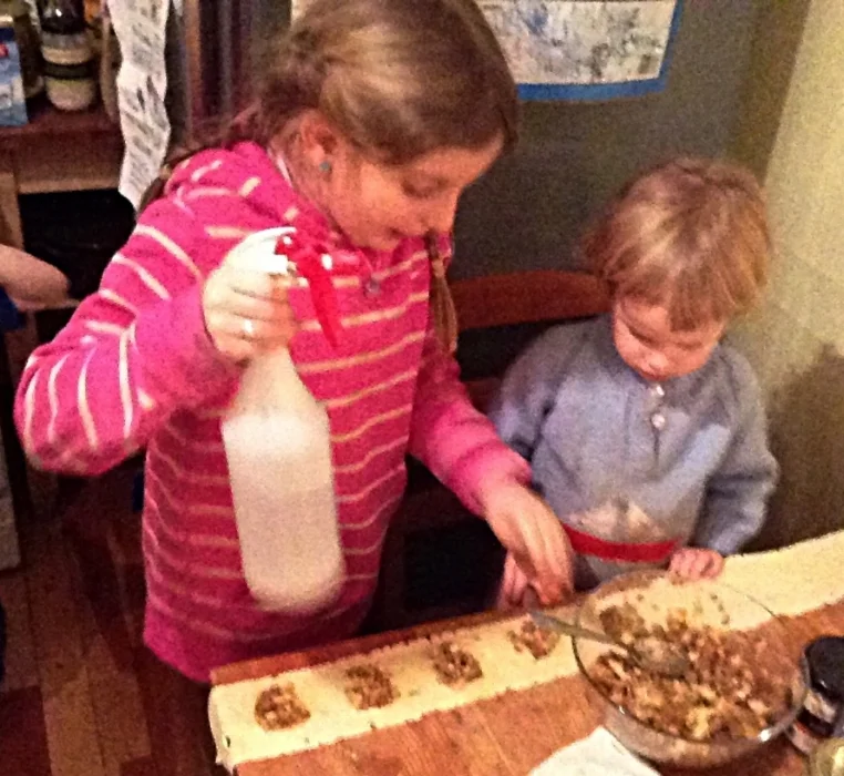 Pork sausage with bacon. The 9-year-old provided great instruction to one of the 2-year-olds!