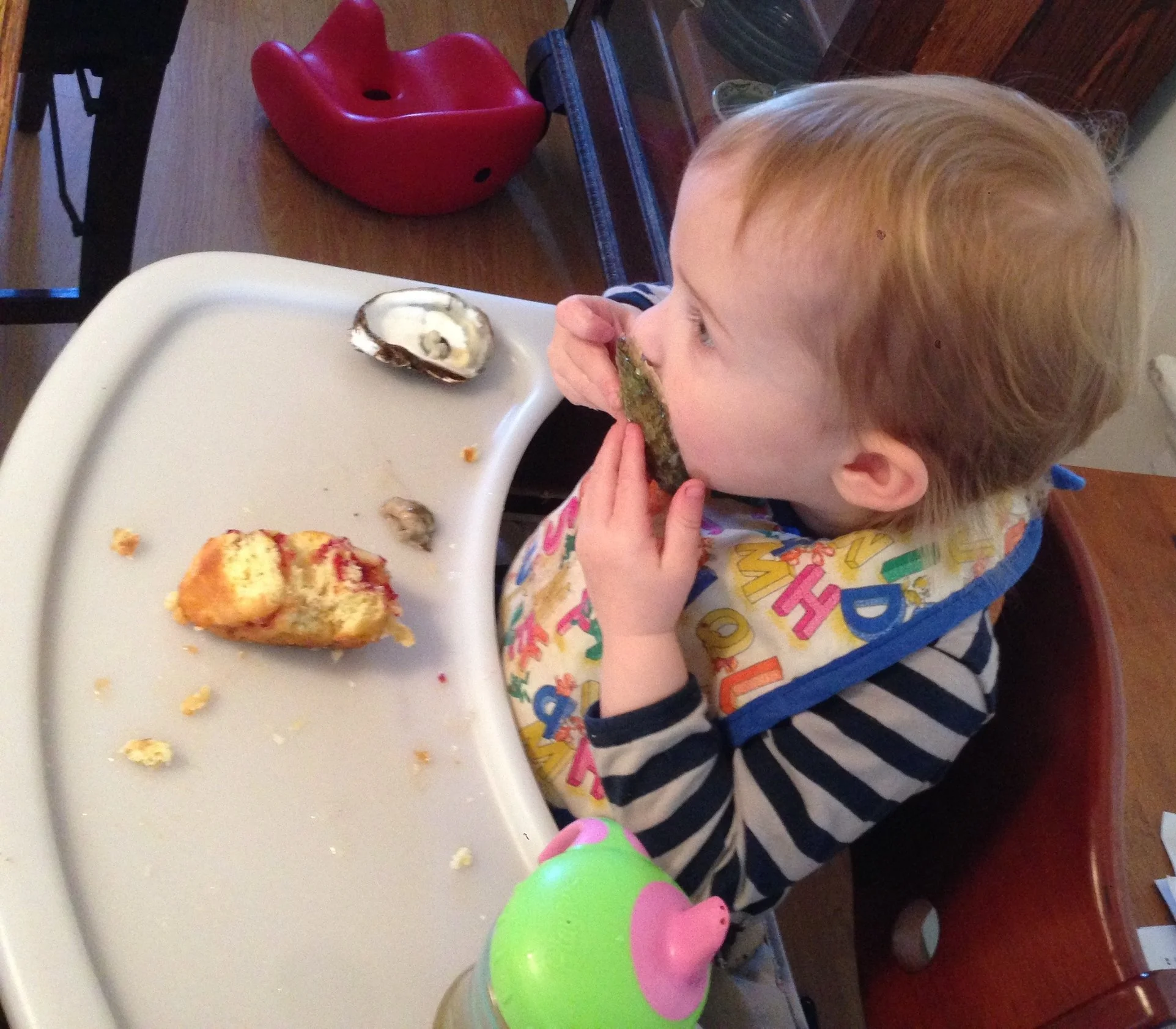 An early fan: Polly at 22 months, enjoying an oyster