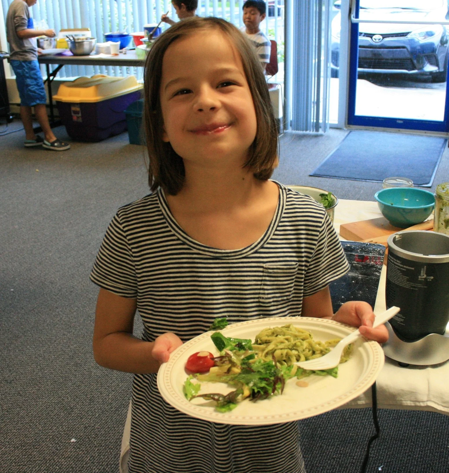This kid ate three helpings of salad! 
