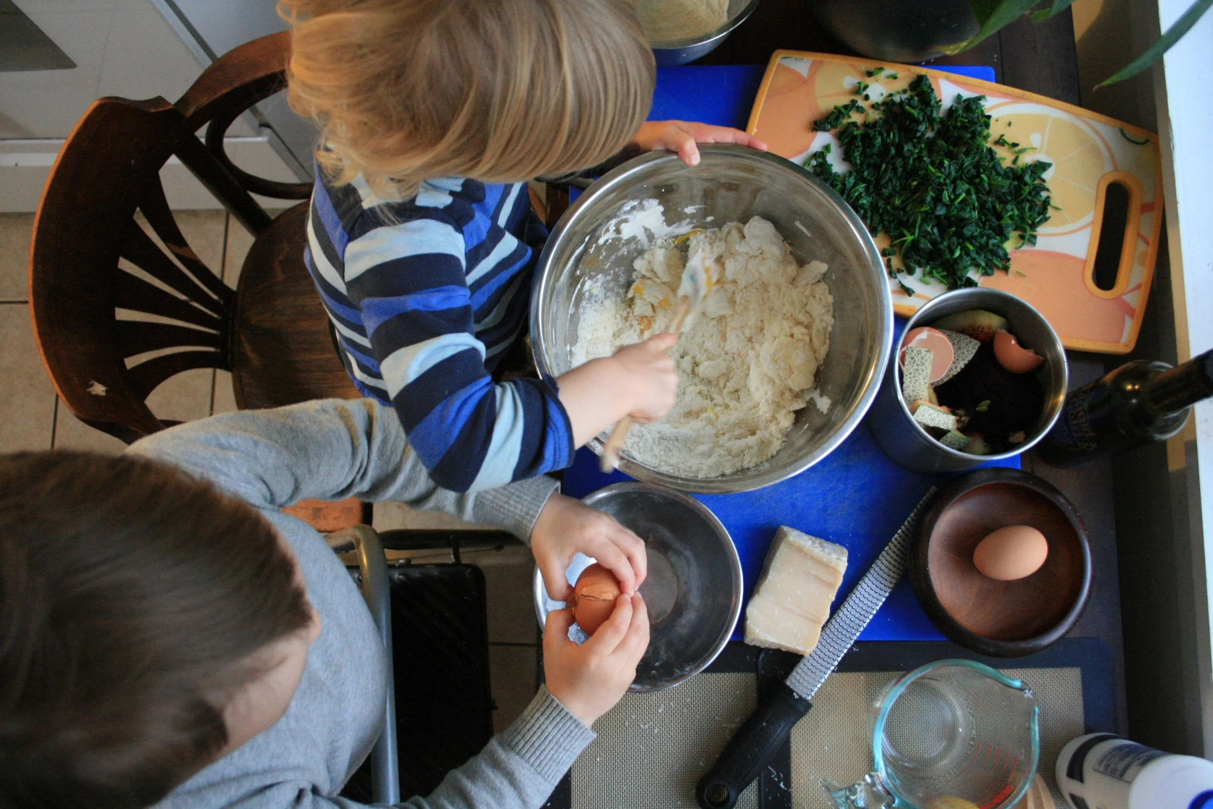 Breaking eggs to add 