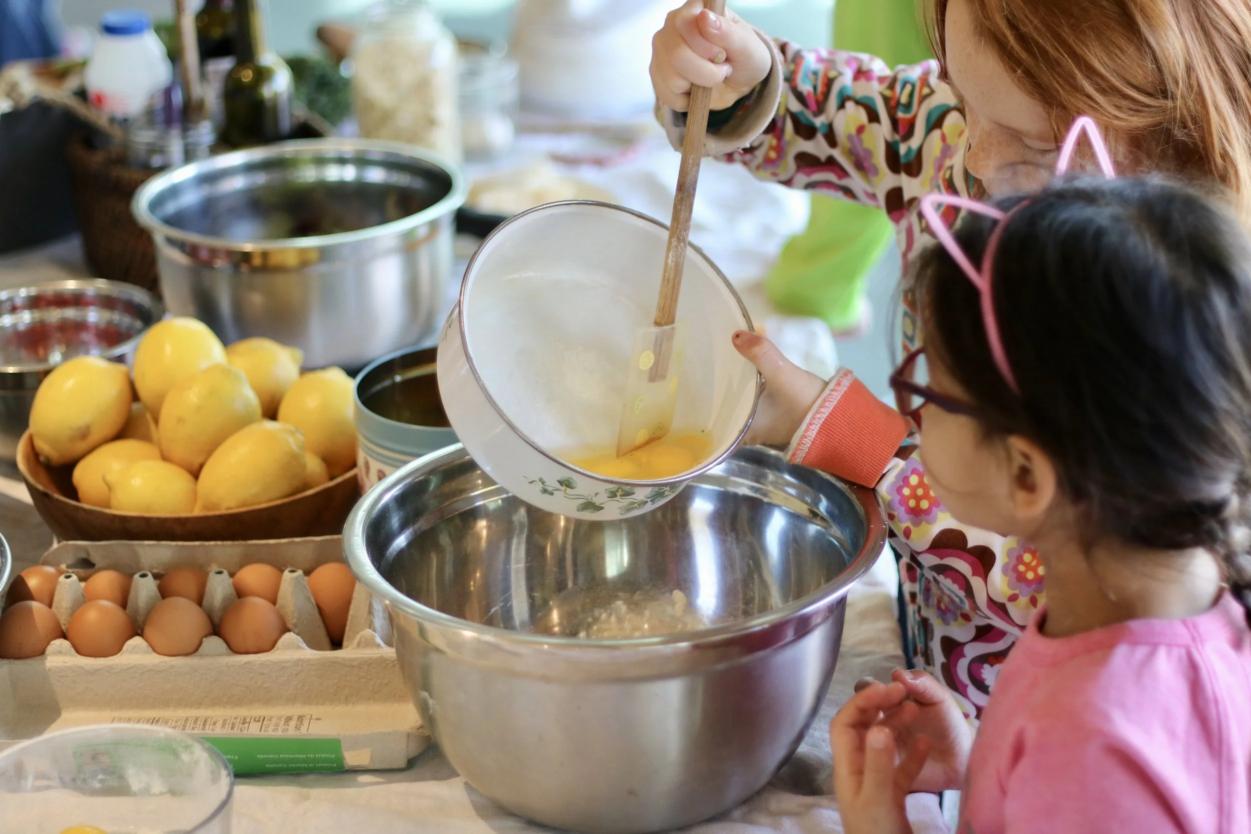 Adding eggs to the flour for pasta dough. Photo by Laura Kirkpatrick