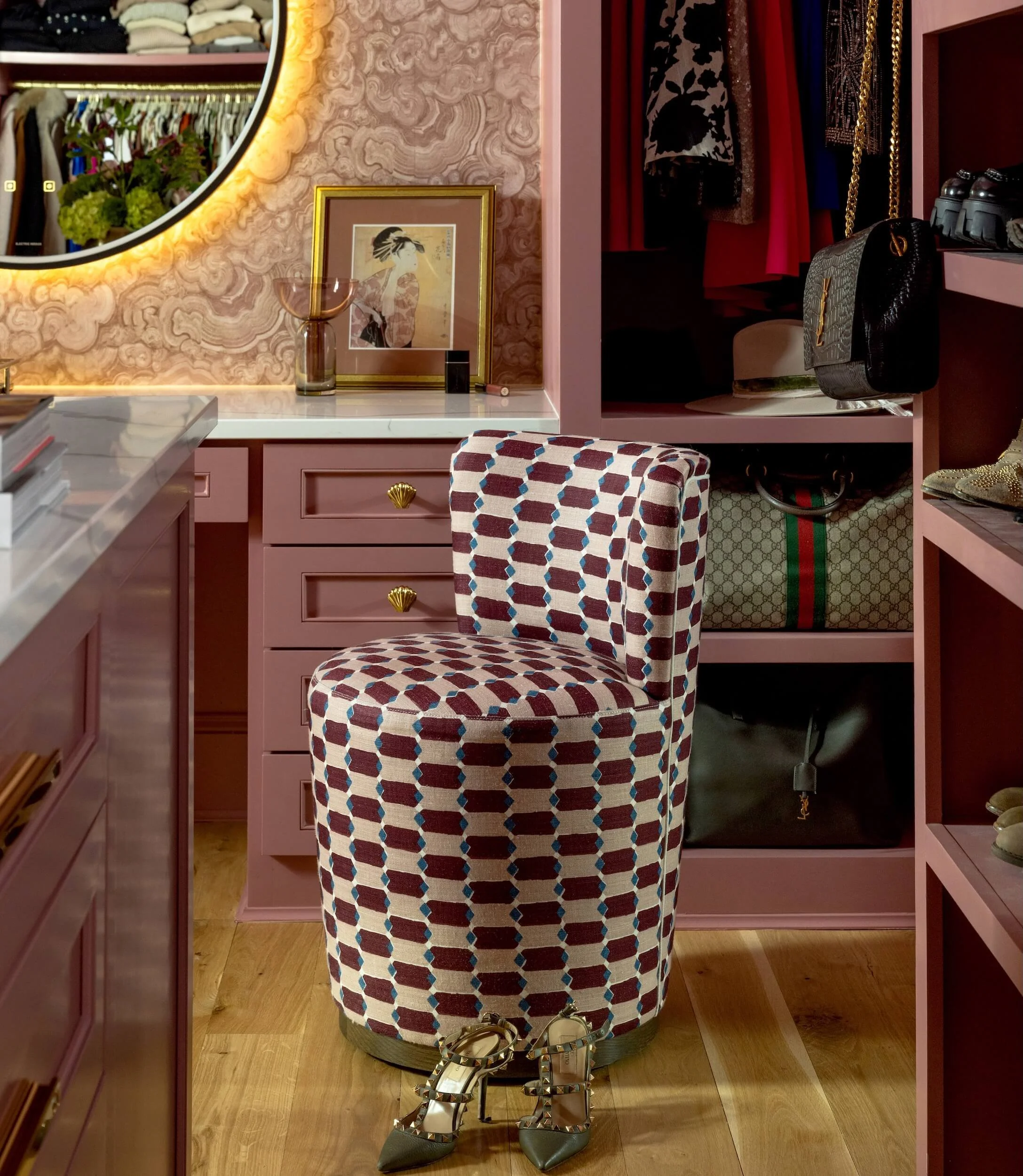 Custom upholstered chair in the pink closet