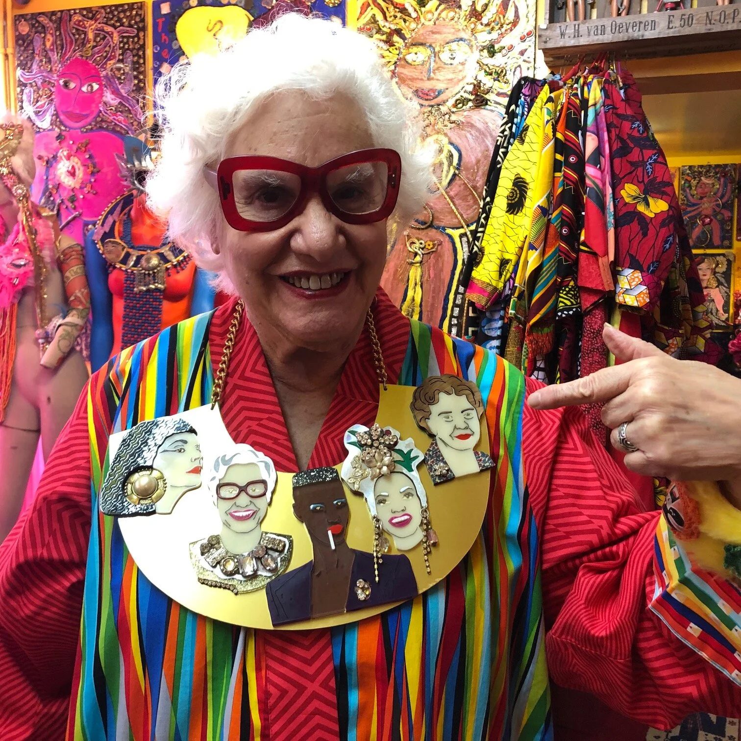 This incredible lasercut neckshrine was created by Sue’s dear friend Elizabeth Joseph.  It features some of Sue’s biggest ‘sheroes’ - Elizabeth Taylor as Cleopatra, Grace Jones, Carmen Miranda, Eleanor Roosevelt and most importantly, herself!