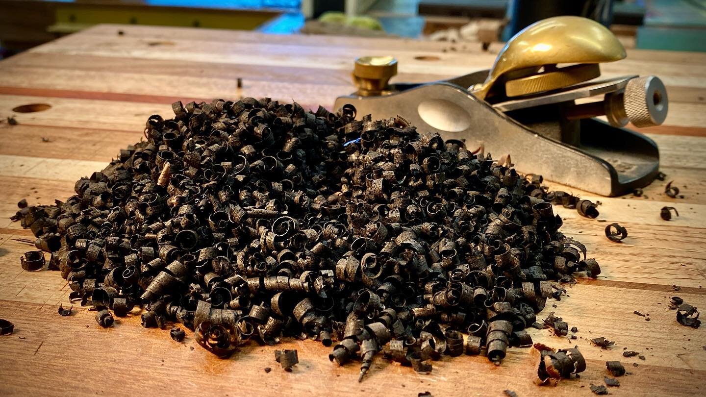 Ebony shavings - cleaning up the inlay work on my current project.  A whole lot of time and effort went in this one - there&rsquo;s light at the end of the tunnel.  More to come. 
.
.

#wood #woodworking #woodartist #woodworker #sacramentowoodworkers
