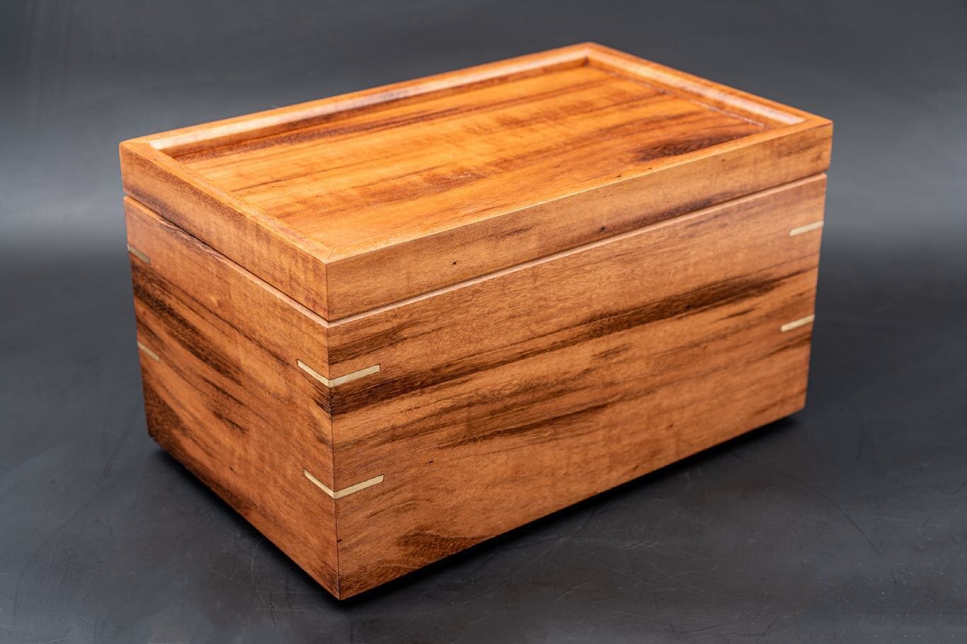 I wanted to challenge myself with something a little bit different for my most recent box.  The main body of this box is made from Goncalo Alves (Tigerwood) with 8 solid brass splines in the mitered corners to give additional support and add a little