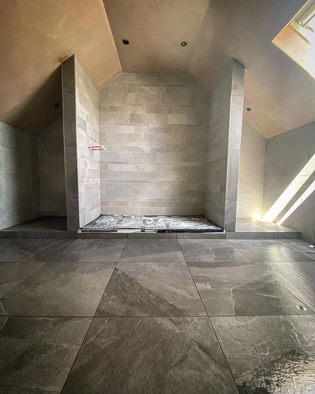 Wrapped up all 3 bathrooms on our Kirk Langley project yesterday. This is the master en-suite. Each side of the shower will be shelving in the alcoves. Mirror going in above the basin. Floor heated with @amberufh. Tiles from @emctiles  XRock range. #