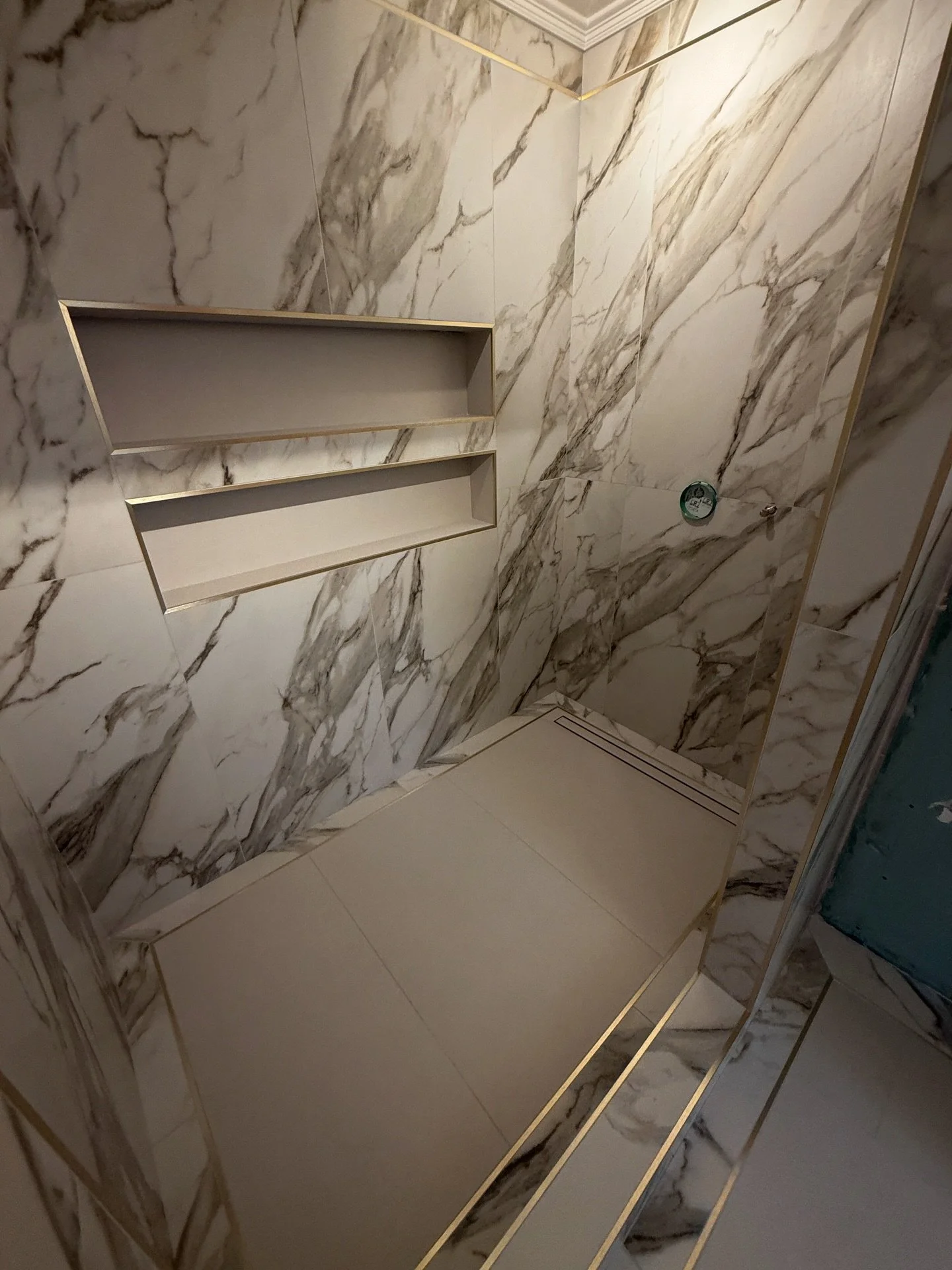 Banger! @studiotwentyinteriors #tiler #tiling #tiles #tilework #tilersofinstagram #tiles #tileslover #tileshower #tiler #tilework #nottinghamtiler #nottinghamtilers #nottinghamtile #tilecontractor  #brass #brasstrim #walkin #walkinshower