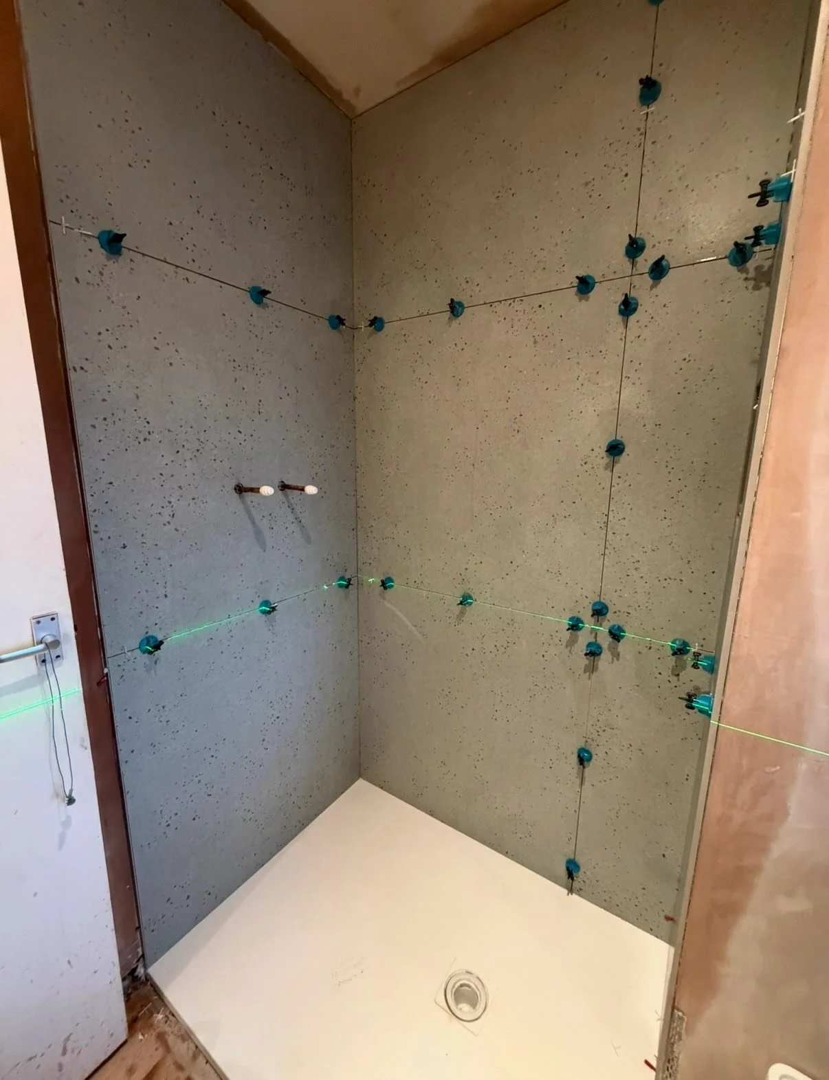 Big tiles in a small space, no spare tiles, no problem. #tiler #tiling #tilework #tiledesign @mandarinstoneofficial