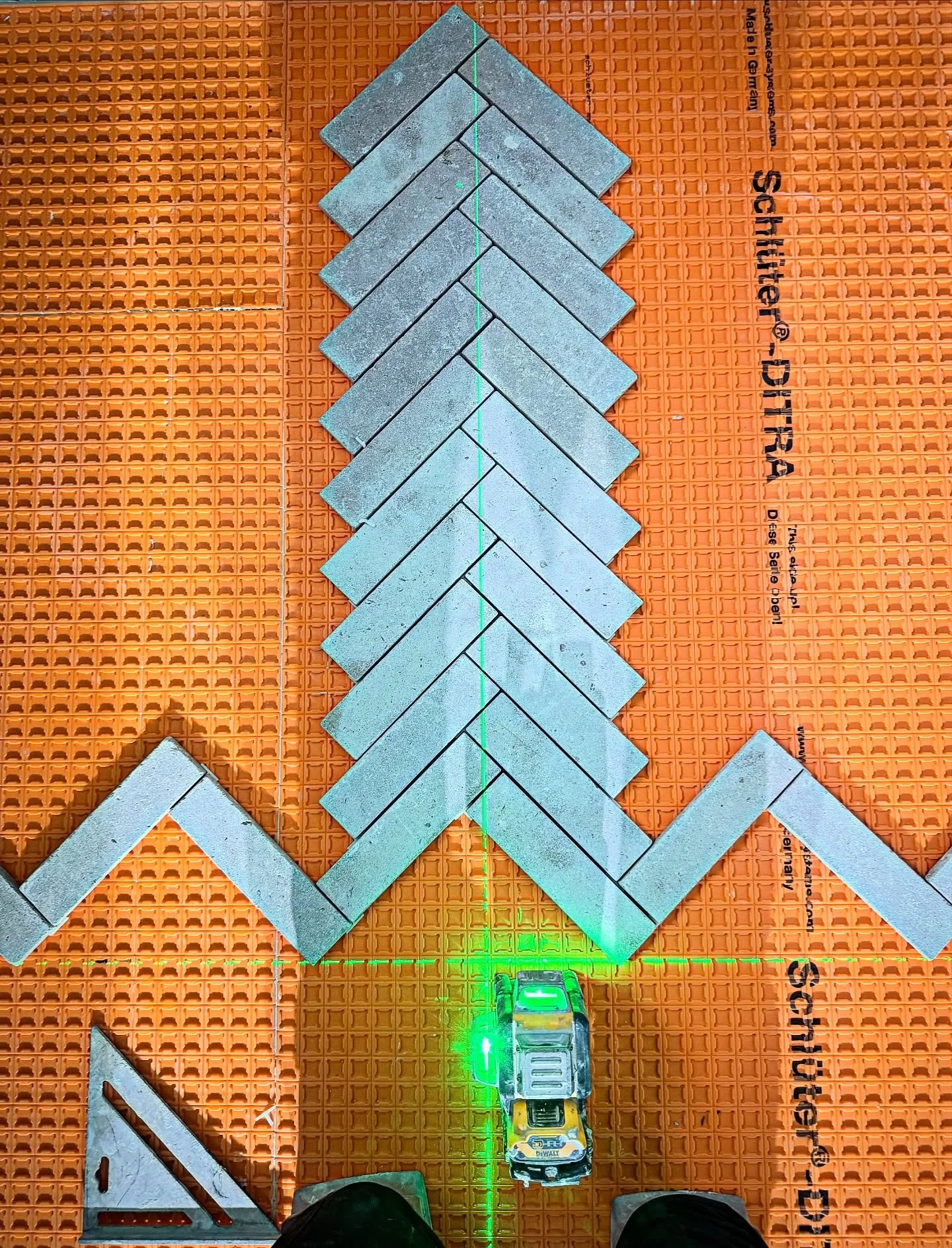 Setting out a herringbone floor 📐 #tiler #tiles #ditra #herringbone #nottinghamtiler