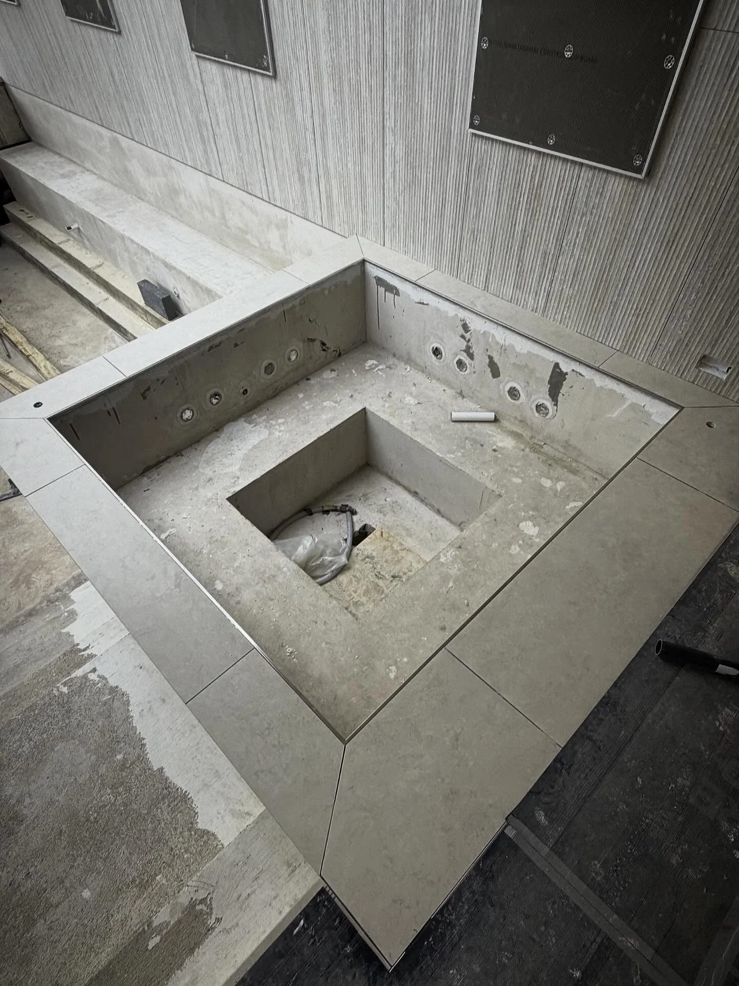 Jacuzzi top now completed after having a delay on the tiles. @schlutersystemsuk stainless steel box trim to frame the jacuzzi ready for some mosaics internally. #tiler #tiling #tiles #tileswork #nottinghamtiler