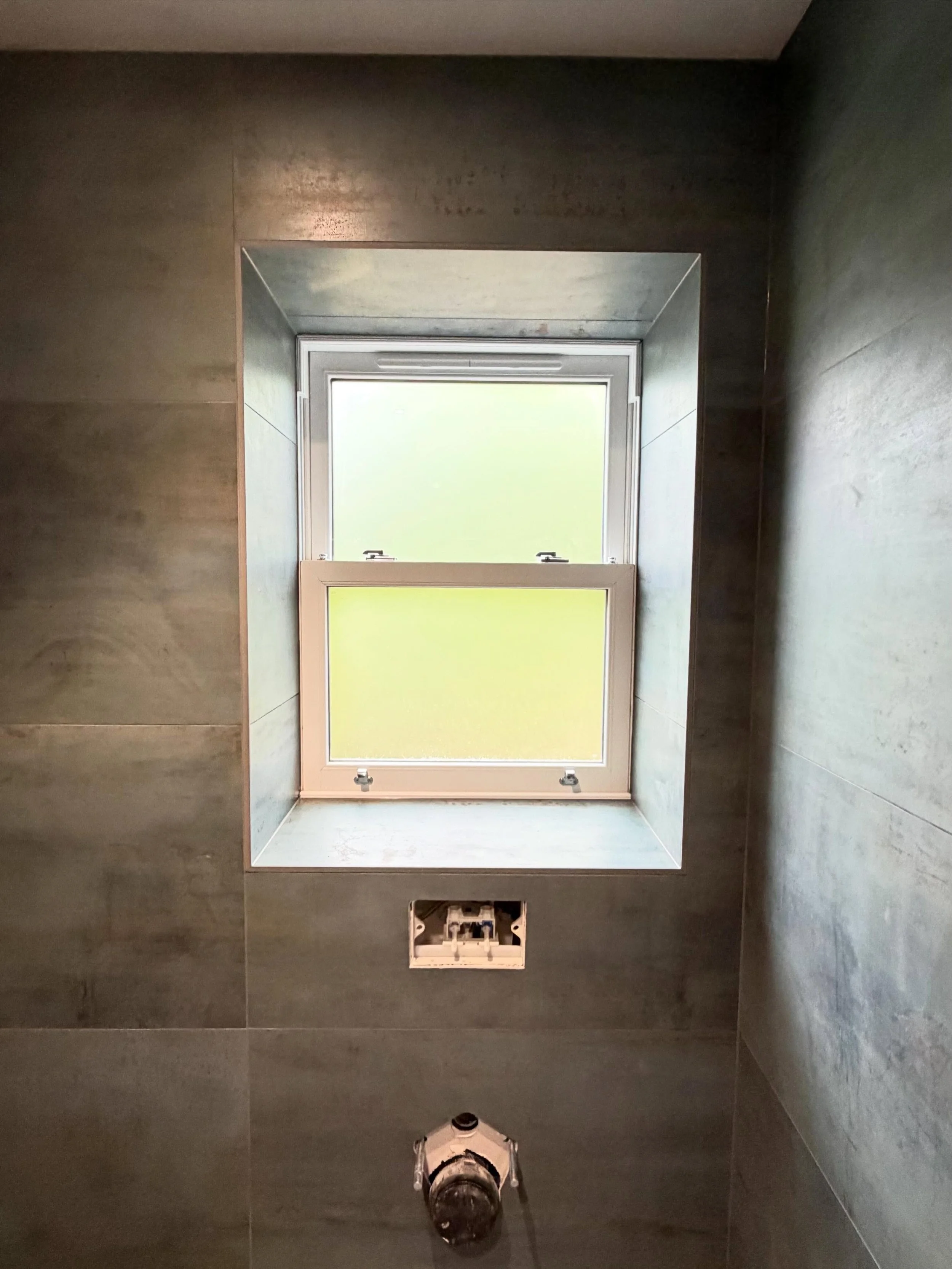 A recently completed toilet room completed for @independentwatersolutions . This one was a revamp of an existing room that had some poorly finished micro cement walls that got replaced with some stunning 1200x600 tiles. We took care of the tiling and