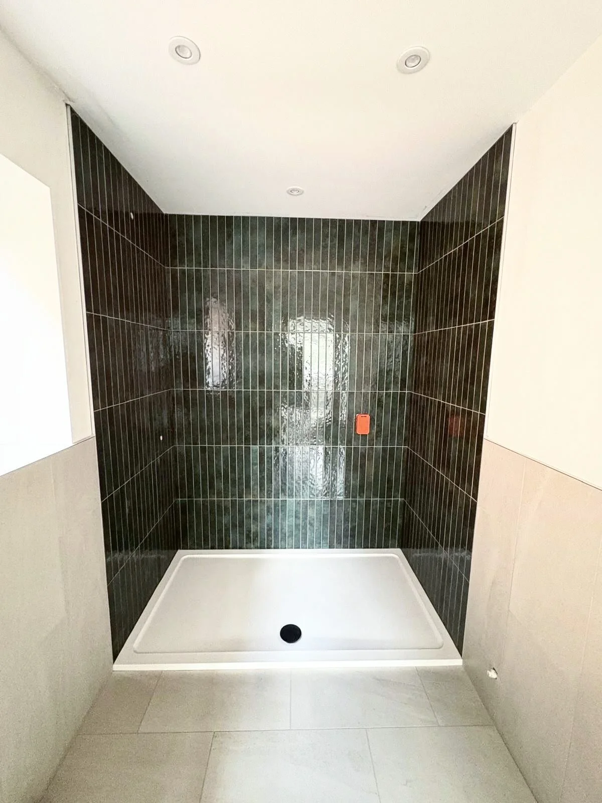 2 matching en-suites at @mcneilconstruction project in Tollerton over the line. Tiles from @emctiles #tiler #tiles #tiling #bathroomtiles
