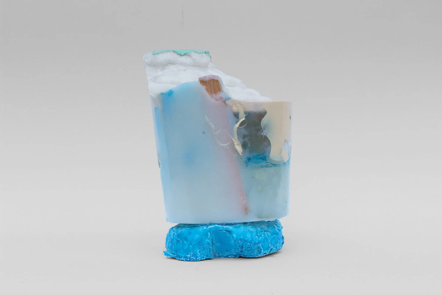 LH 10, 2016, resin, cotton flakes, pigment, medical examination gloves, stirrer, liquid rubber, 17 x 12 x 12 cm