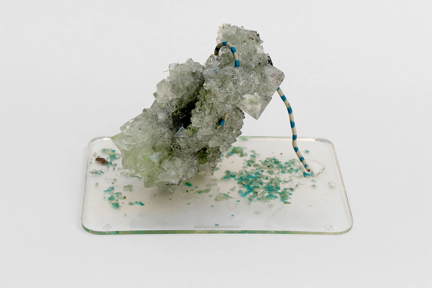 SP30, 2016, potassium alum, rubber mat, pigment, wire, labdust (resin, copper sulfate, styrofoam, wax, potassium alum, thread, dog hair), 17 x 12,5 x 10 cm