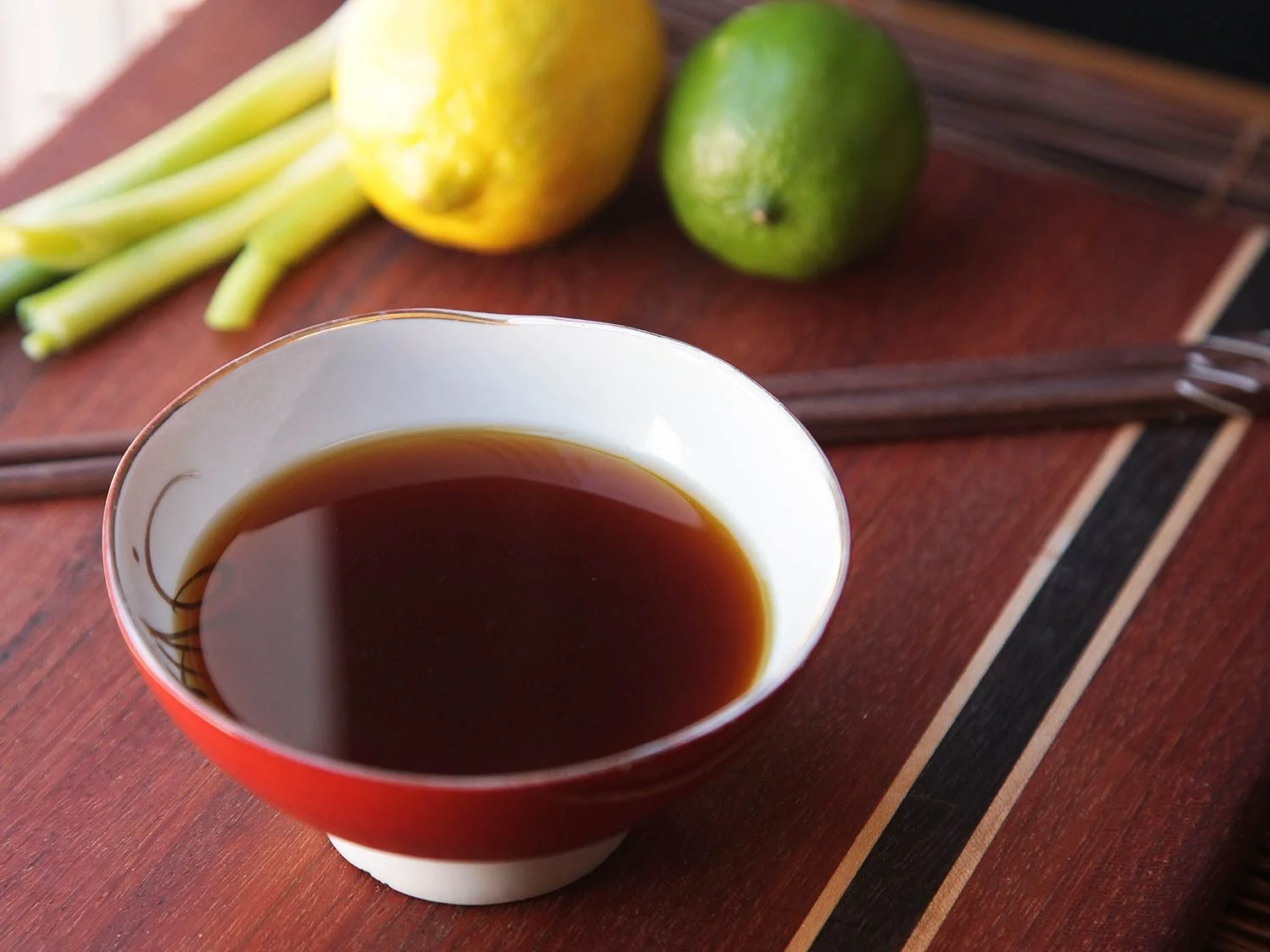 Ponzu: a citrus-based sauce commonly used in Japanese cuisine. It is tart, with a thin, watery consistency and a dark brown color.