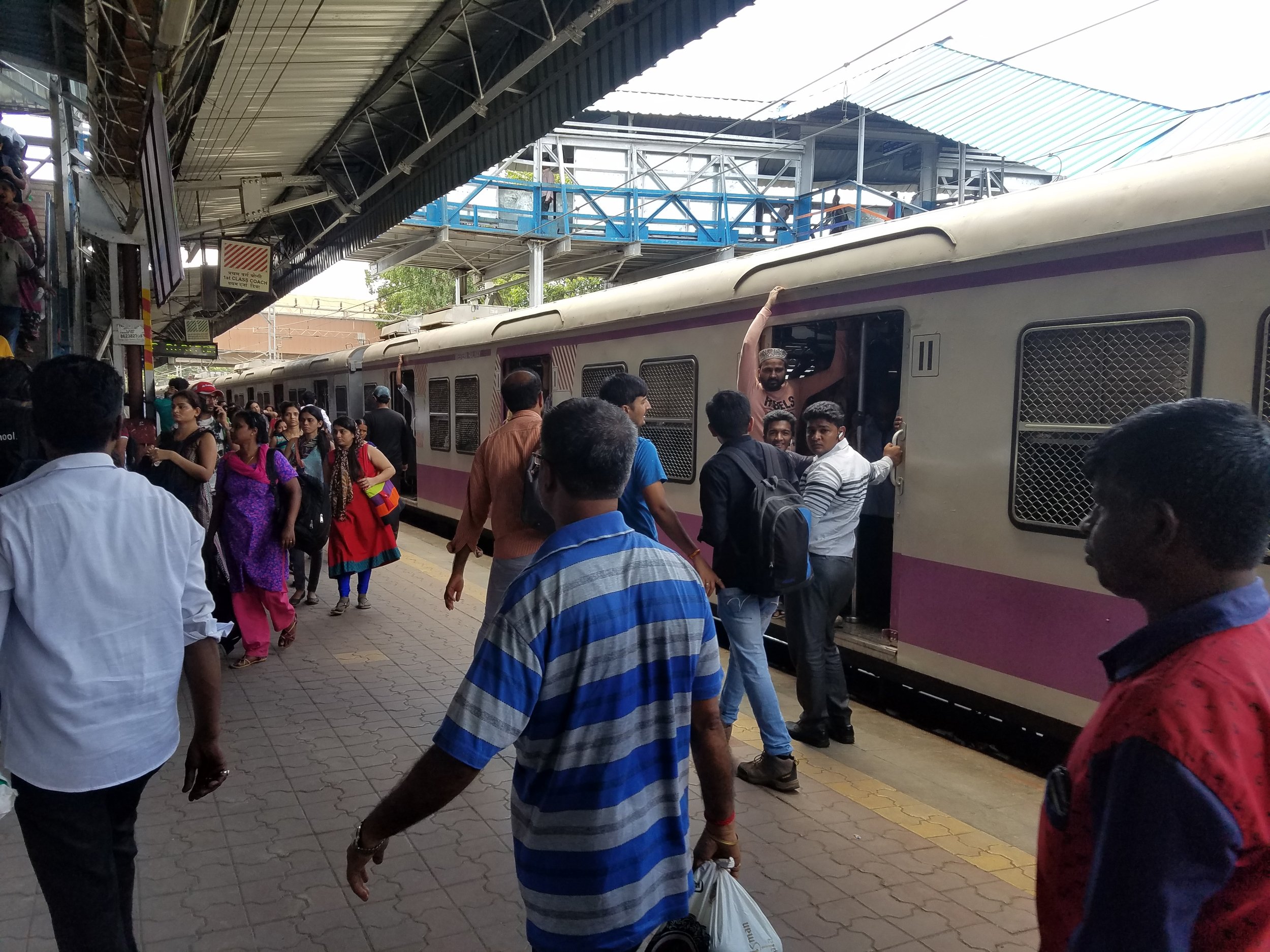 Yes the train comes in fast, but it didn't seem all that different than NYC subways to me. The doorways are open. There is far less traffic today as it's a Sunday during the big Indo-Pak cricket match. 