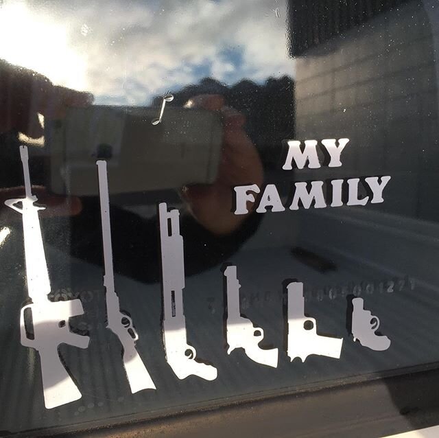 Nuclear family? Sticker on ute back window parked (too) near our home.