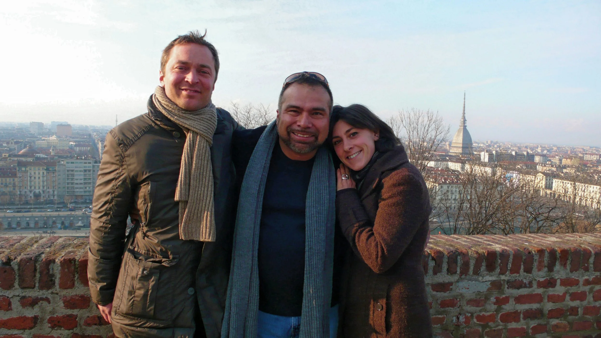 Patrik Bonardi Board Member, his wife Her Royal Highness Countess Carlotta of the House of Savoy, and  Gustavo A Yanez CFO  strolling above Turin, Italy. 