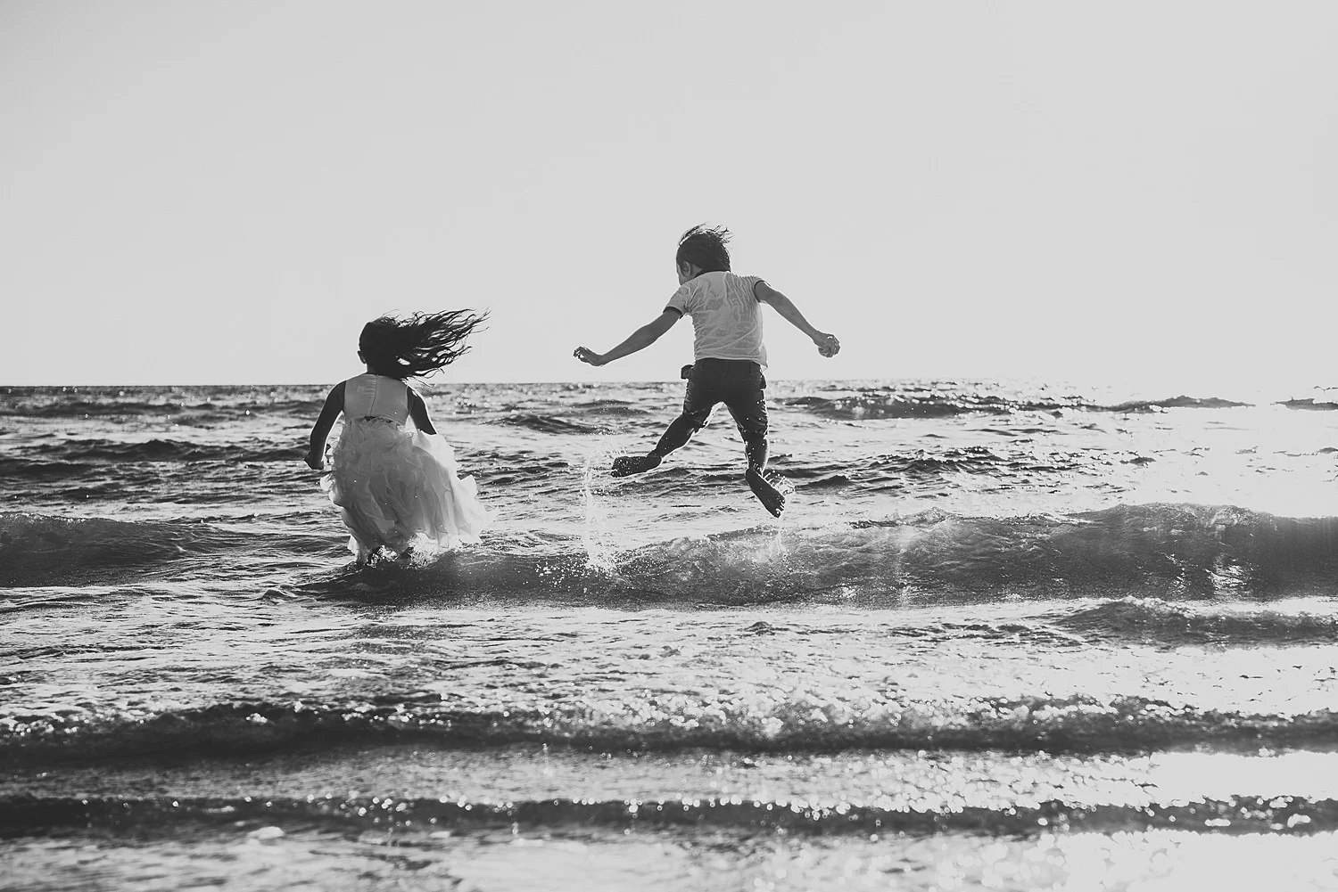 girl and boy on beach