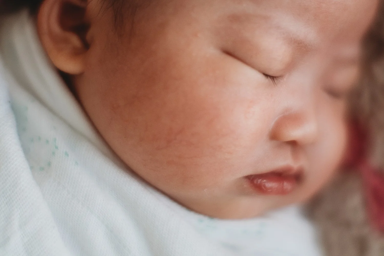 close up of baby cheek