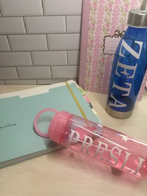 Water bottles with Cricut Font Kate's ABC's