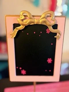 bow picture frame with snowflakes