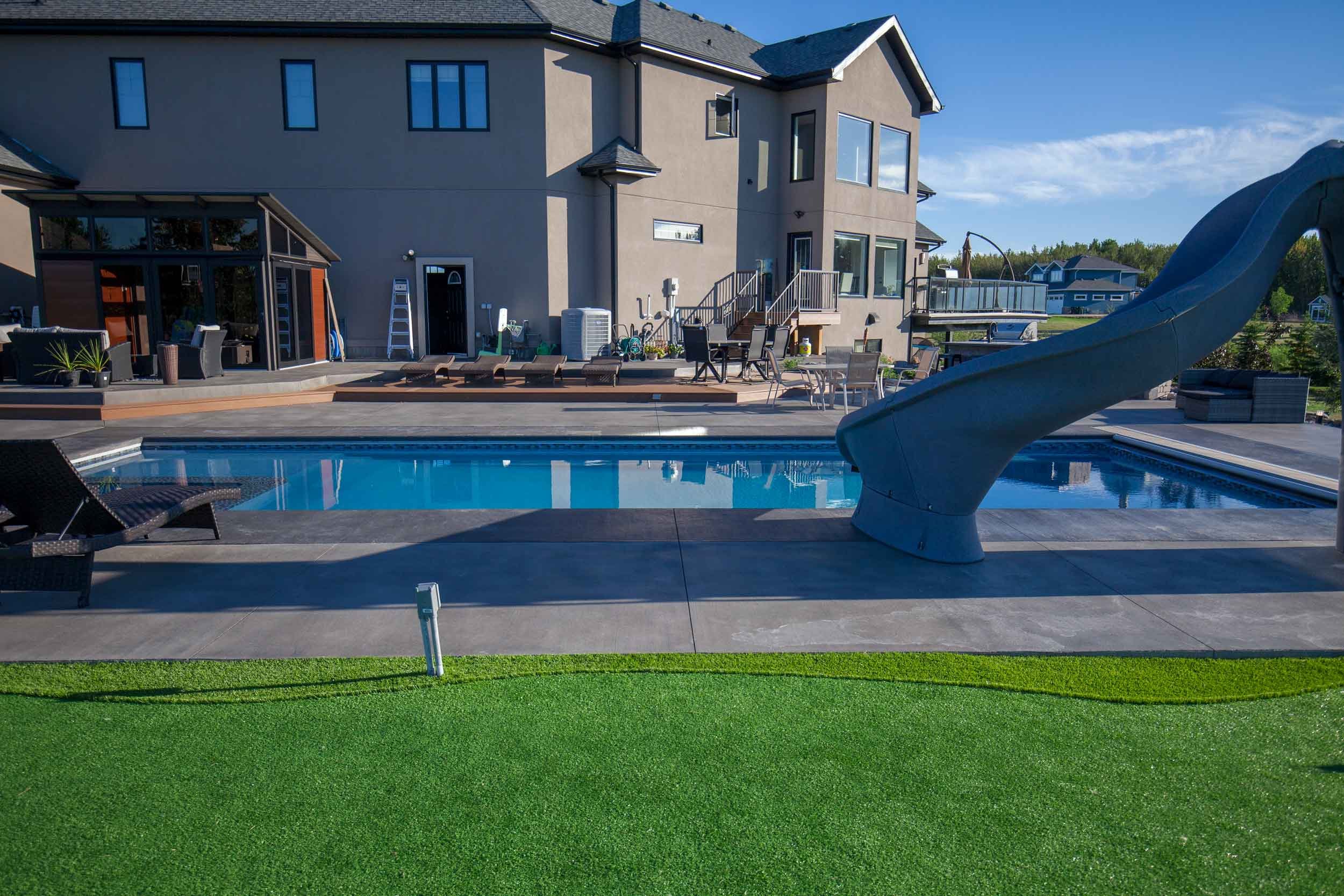 Backyard_Pool_with_a_Slide.jpg