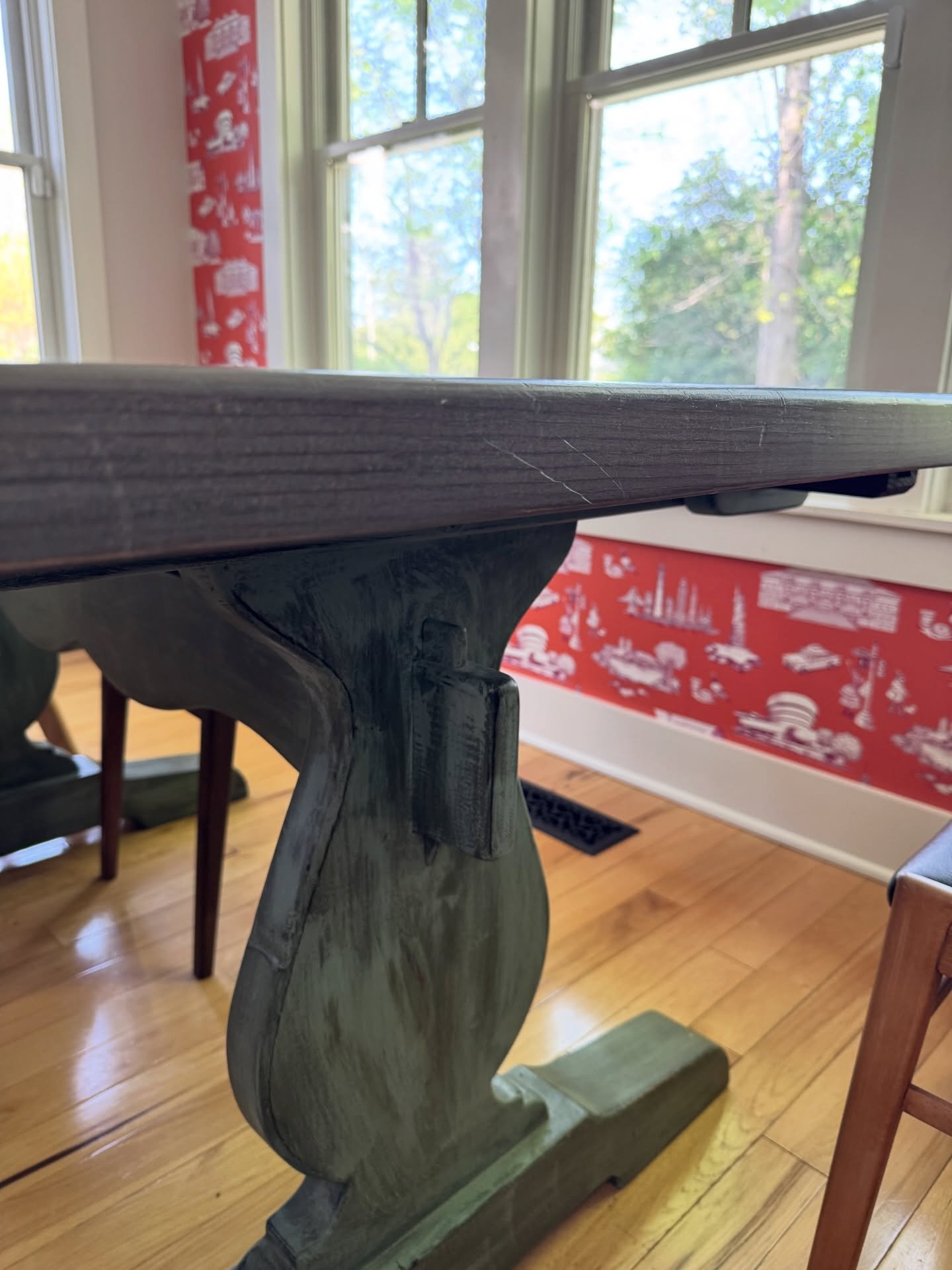 This is our itty bitty dining nook. 

I am in the middle of wallpapering it (I ran out so it&rsquo;ll be a while before it&rsquo;s finished 😭)

Now I&rsquo;ve decided I need to change the color of the table. I painted this once already and refinishe