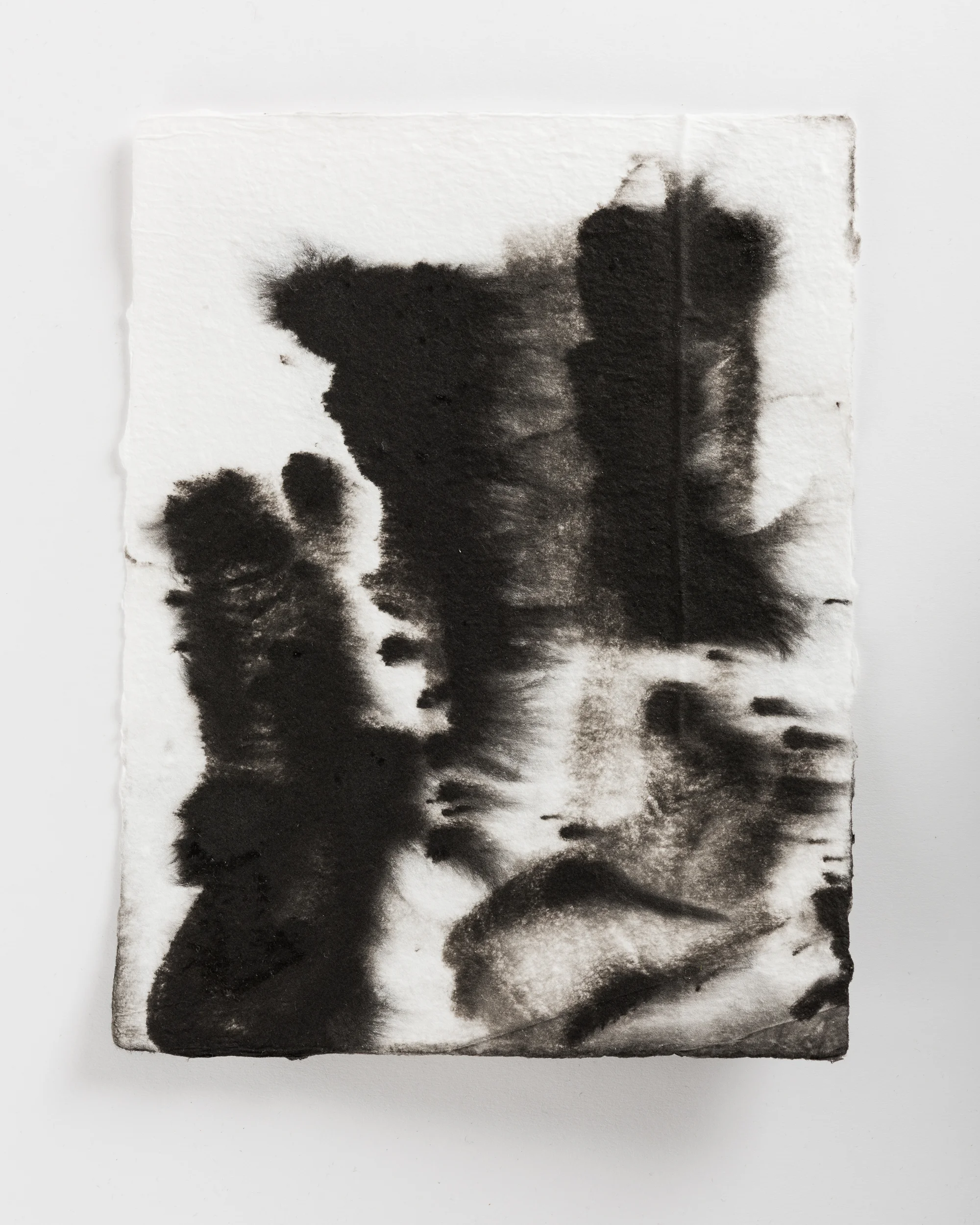 Handmade paper. Made by hydrating and beating cotton linter, and then forming 8x10 sheets onto a vacuum table and adding black pigment directly to the wet sheets.