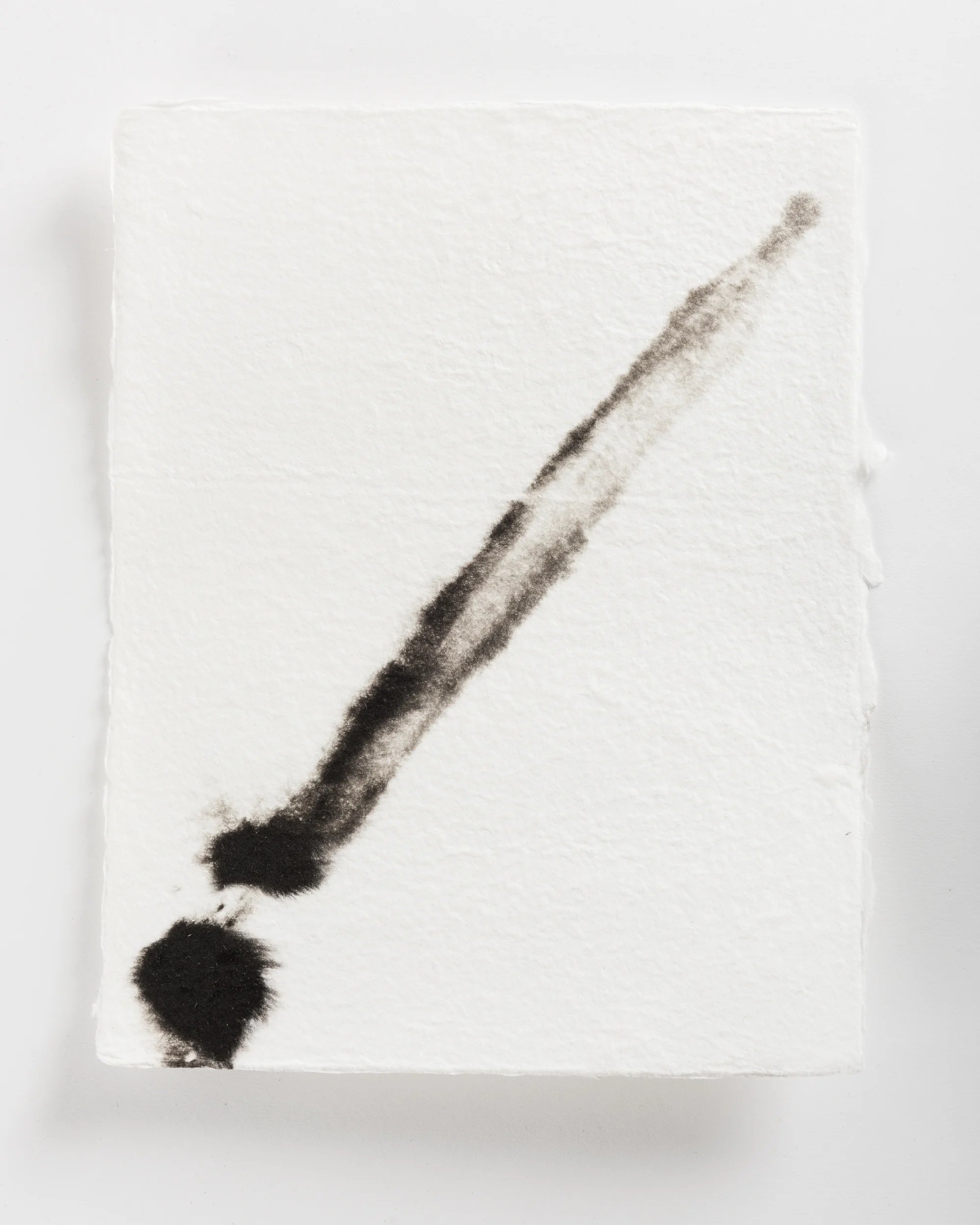 Handmade paper. Made by hydrating and beating cotton linter, and then forming 8x10 sheets onto a vacuum table and adding black pigment directly to the wet sheets.