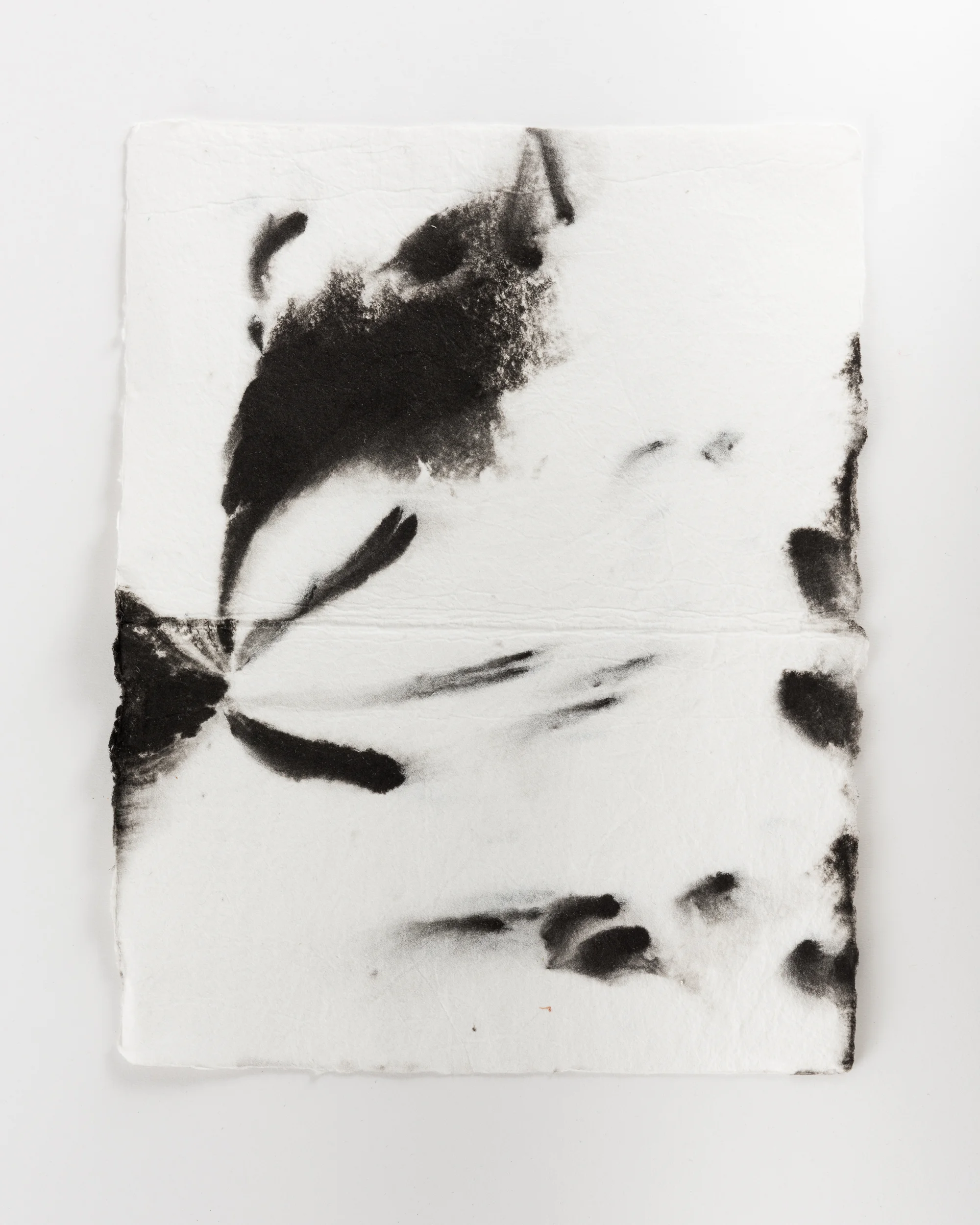 Handmade paper. Made by hydrating and beating cotton linter, and then forming 8x10 sheets onto a vacuum table and adding black pigment directly to the wet sheets.