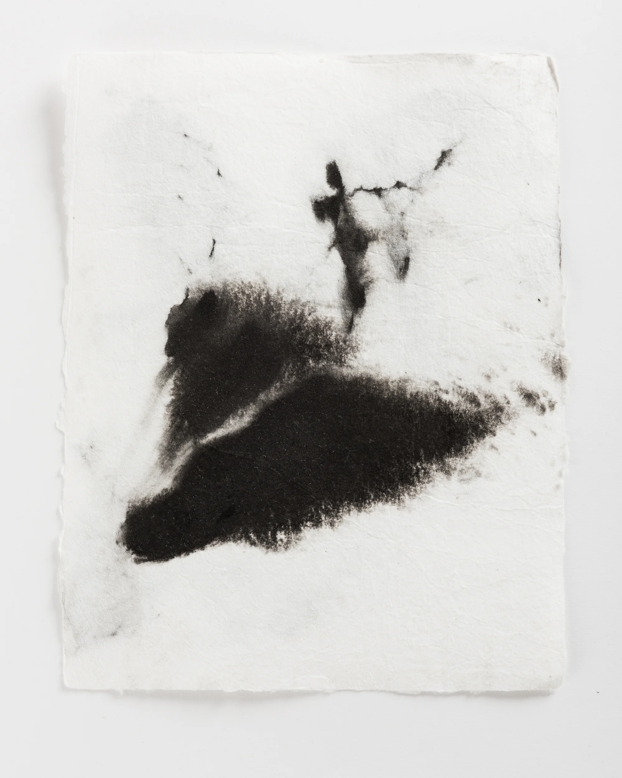 Handmade paper. Made by hydrating and beating cotton linter, and then forming 8x10 sheets onto a vacuum table and adding black pigment directly to the wet sheets.