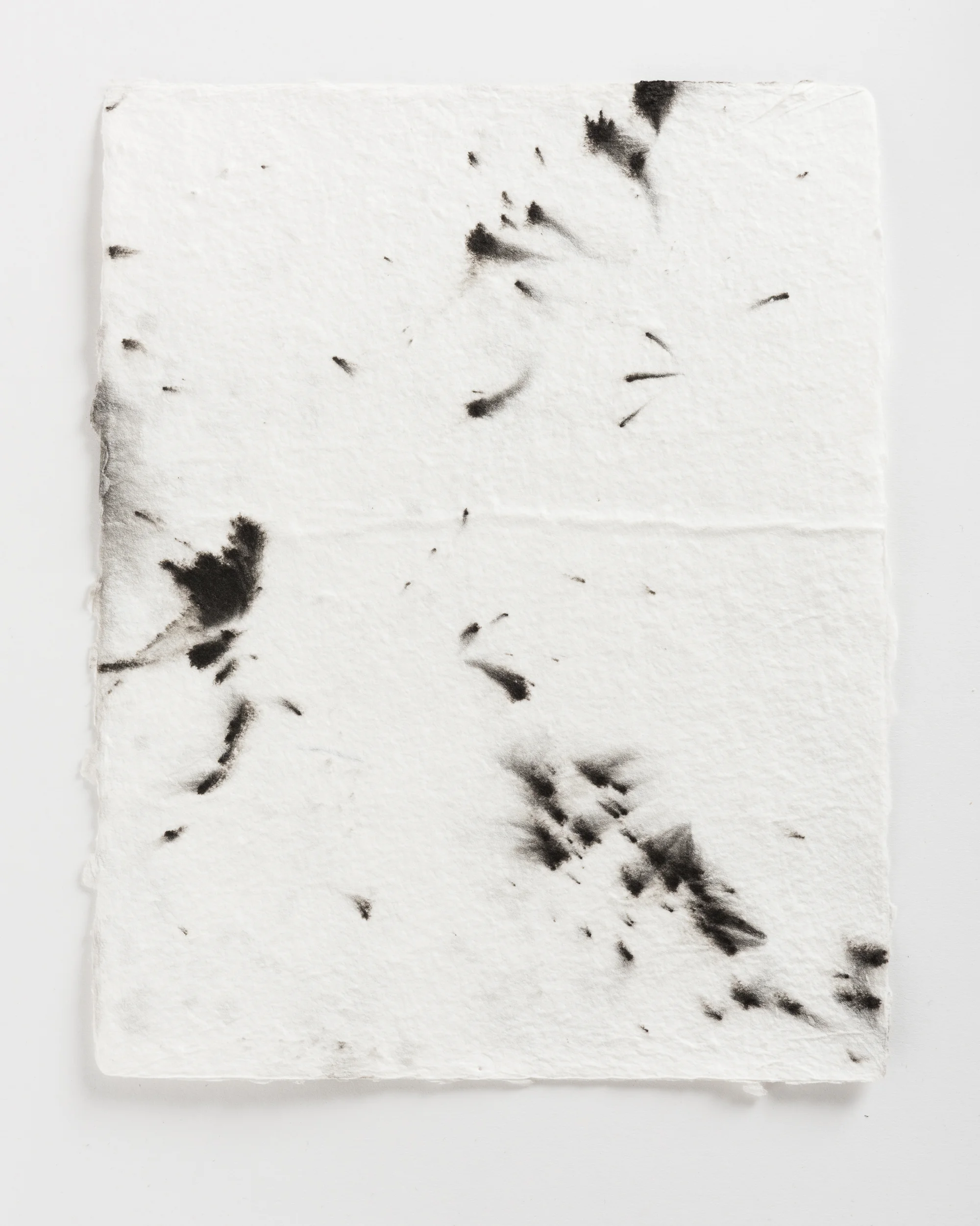 Handmade paper. Made by hydrating and beating cotton linter, and then forming 8x10 sheets onto a vacuum table and adding black pigment directly to the wet sheets.