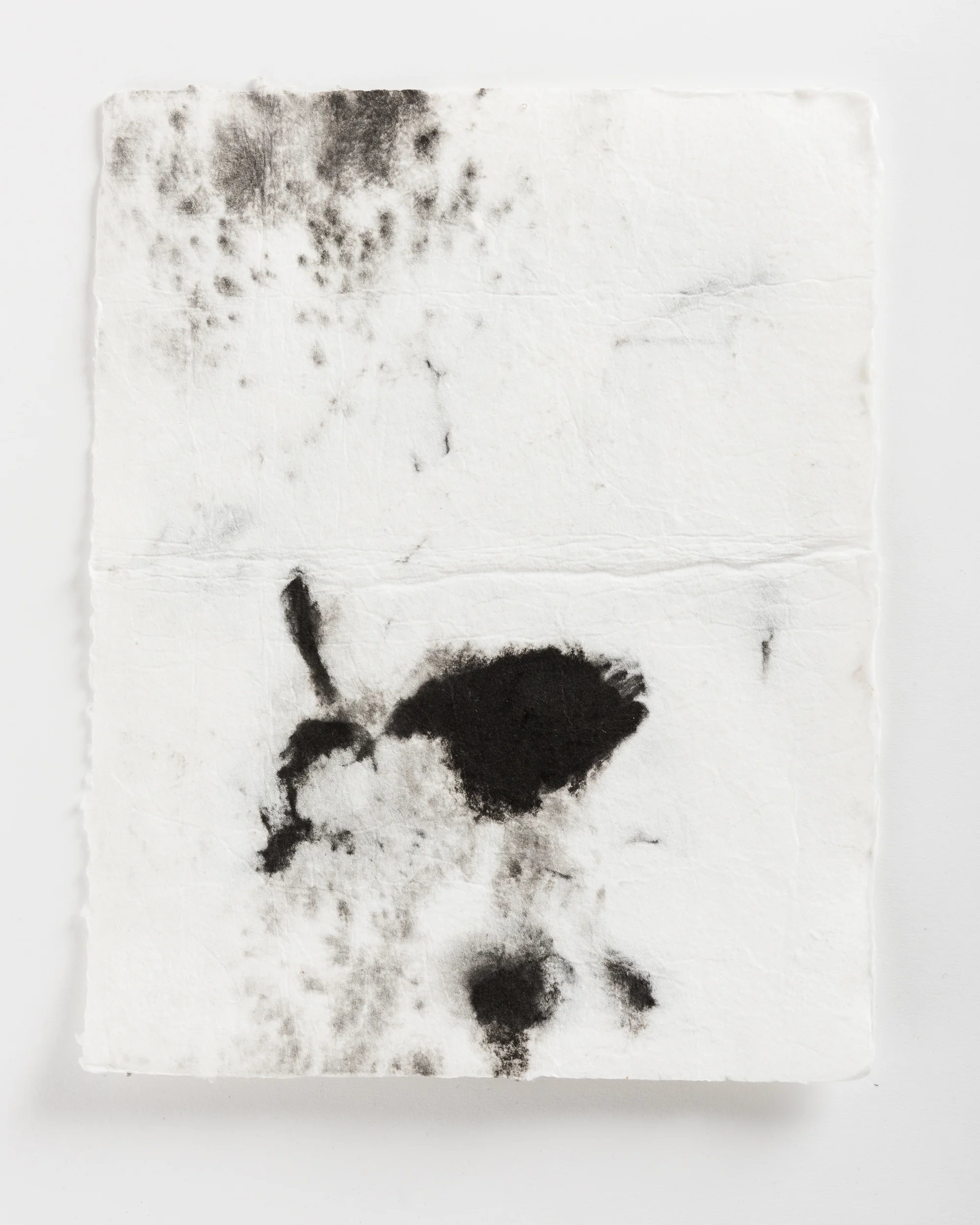 Handmade paper. Made by hydrating and beating cotton linter, and then forming 8x10 sheets onto a vacuum table and adding black pigment directly to the wet sheets.