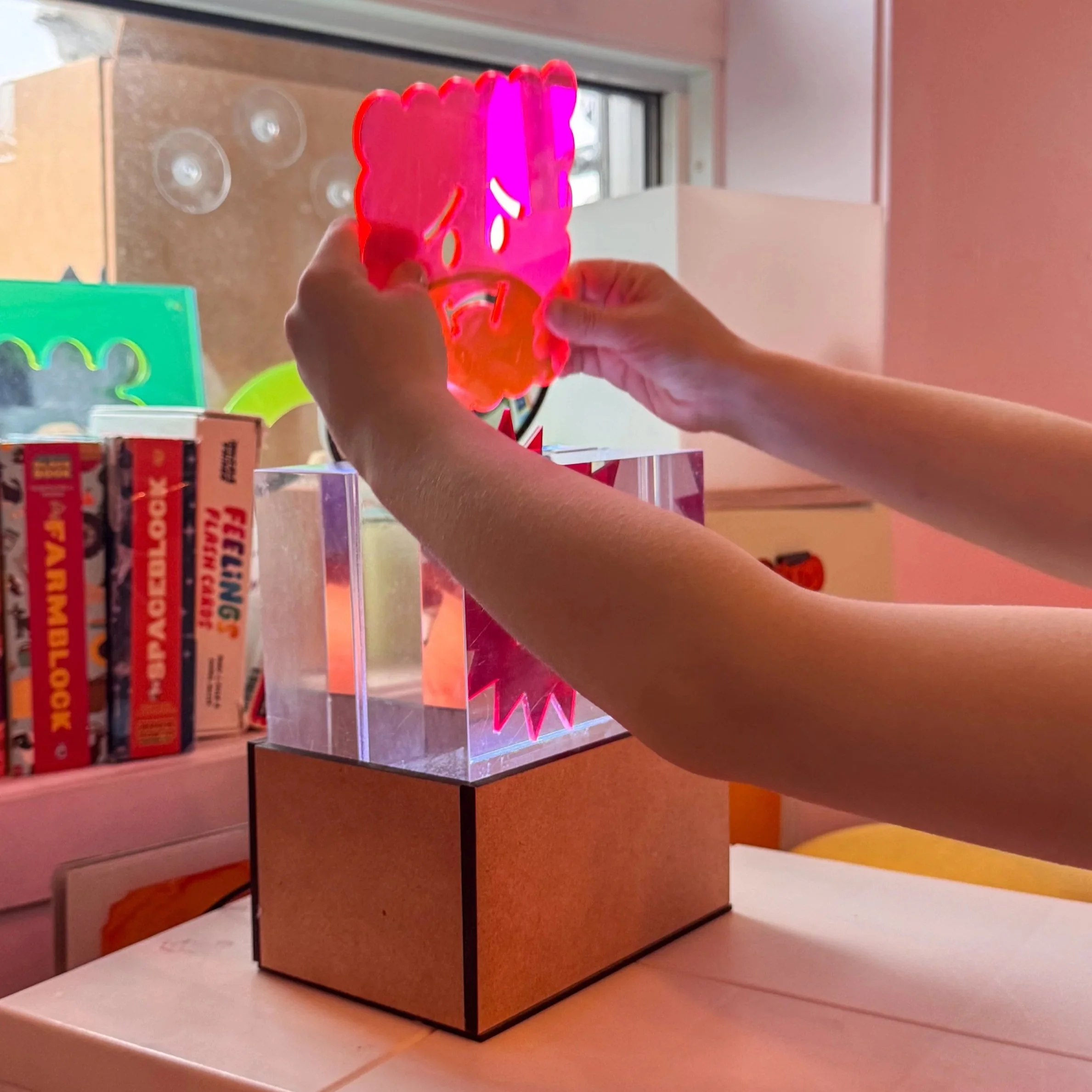    Emotion Signal Light    Light with 8 emotion faces that are interchangeable for the user to be able to signal how they are currently feeling. Supports  non-verbal expression , reducing verbal and cognitive load. Communicates emotional states throu