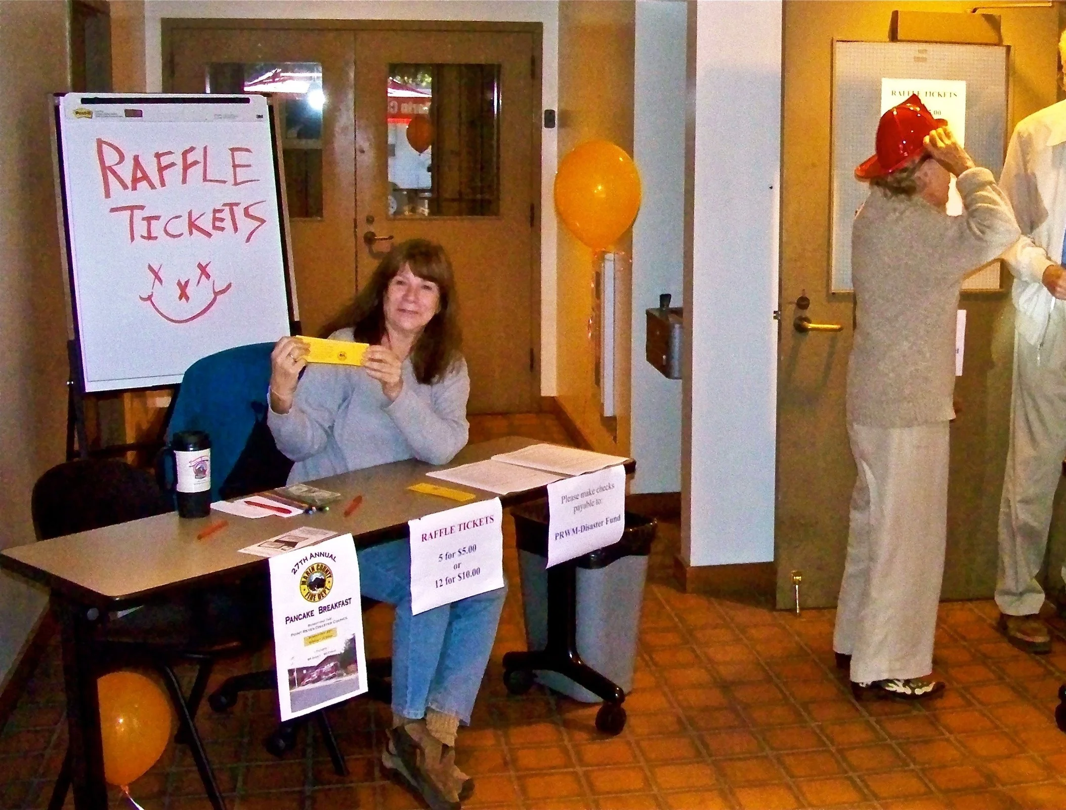 Selling tickets, Pancake Breakfast, Point Reyes Station firehouse.