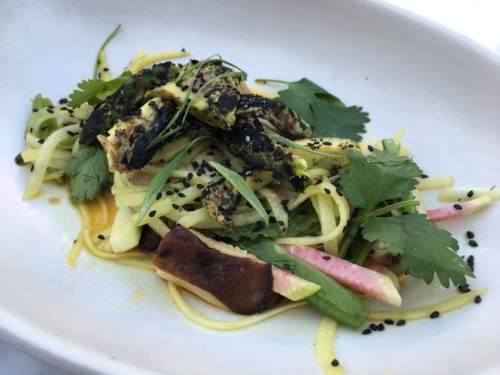 TFK's new exciting Torched Avocado vegetarian dish made withcucumber noodle, mushroom, snap pea, radish, sesame, and turmeric ponzu.