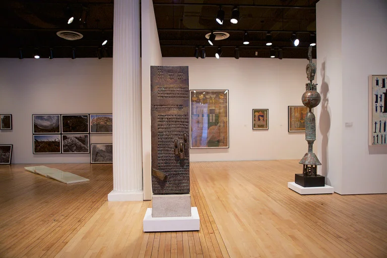 Installation view, ‘Global/Local 1960–2015: Six Artists from Iran’ at Grey Art Gallery, New York University, with Parviz Tanavoli’s “Heech Tablet” (1973) in the center foreground (photo by Alvia Urdaneta Studio)