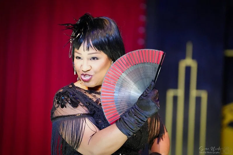 Safira singing as Mama Morton in the musical Chicago