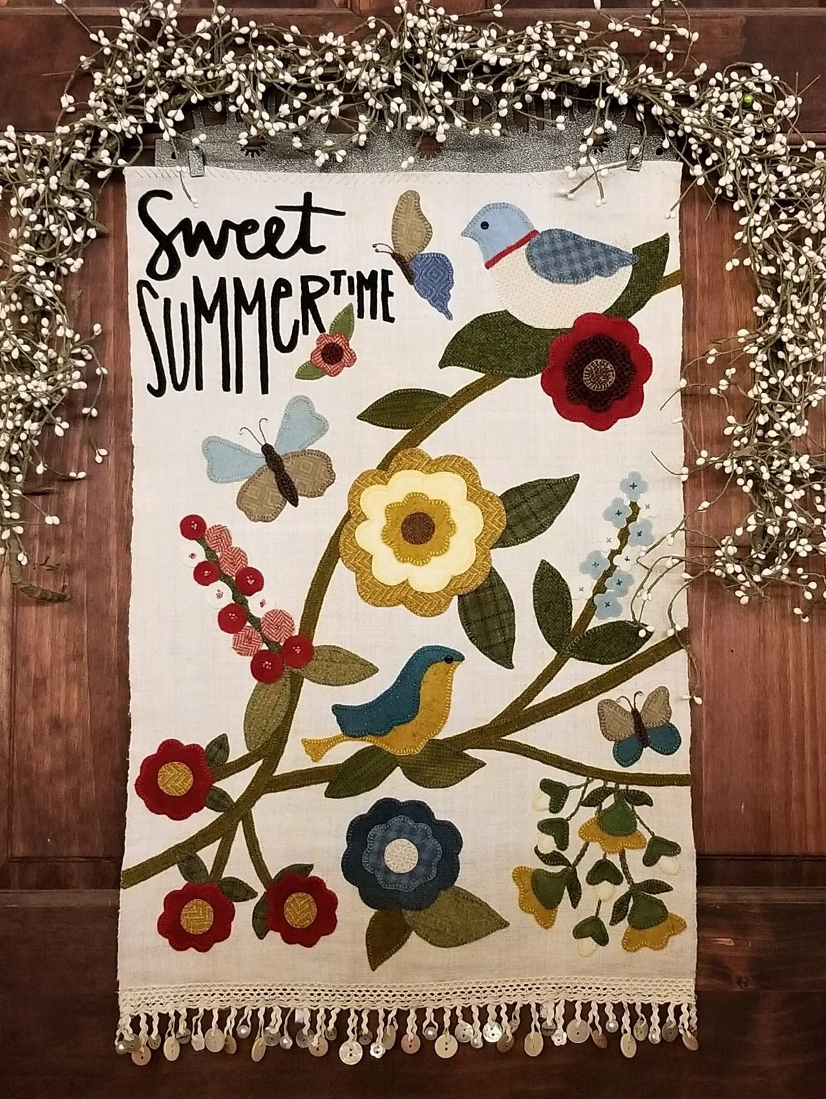 Let's get ready for summer with Sweet Summertime. Hand dyed wool for your applique will be used on antique linen. The linen that you will use for your background was handwoven in the late 1800's and comes from Europe! Each piece will be just a bit different as these backgrounds are very old. The wool is all hand dyed and felted from Sew Cherished and your piece will be finished off with a fun button trim.