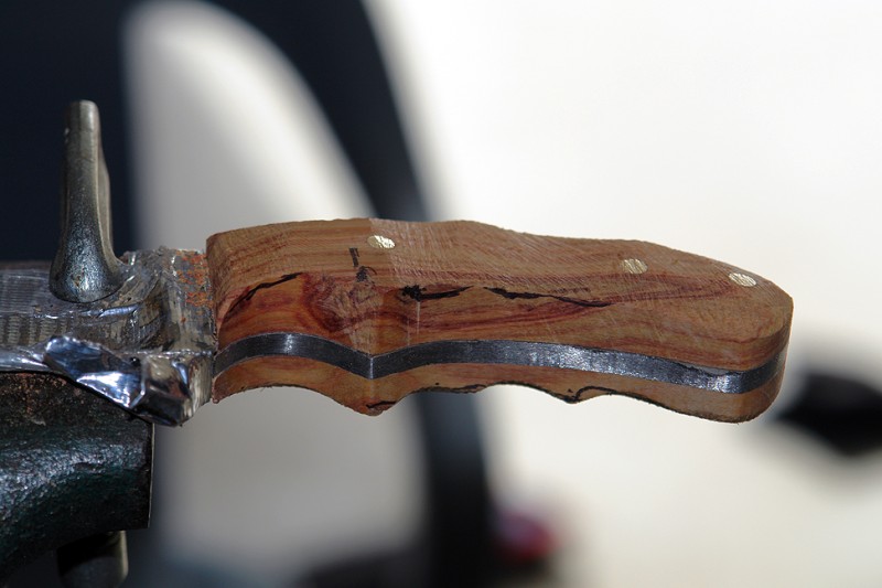 Some more of the profile trimmed off, with the sides still vertical. One brass rod ended up on the ridge between finger slots.