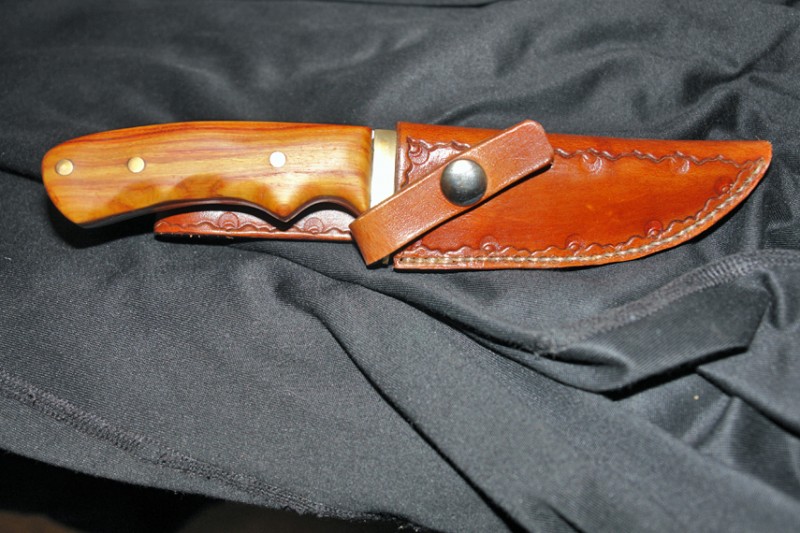 and finally, a sheath to match, and the brass and blade polished up a bit.