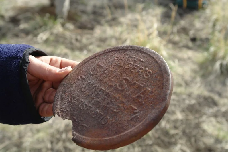 Above: we found a metal can lid to what must have been a big can of coffee. I wonder when this can of coffee was made.